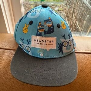 Headster Blue Character Print Snapback Hat